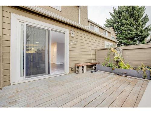 1203-829 Coach Bluff Crescent Sw, Calgary, AB - Outdoor With Deck Patio Veranda With Exterior