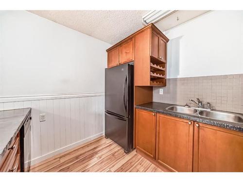 1024 Ranchview Road Nw, Calgary, AB - Indoor Photo Showing Kitchen With Double Sink