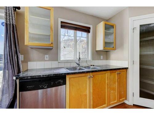 130 Royal Birch Mount Nw, Calgary, AB - Indoor Photo Showing Kitchen With Double Sink