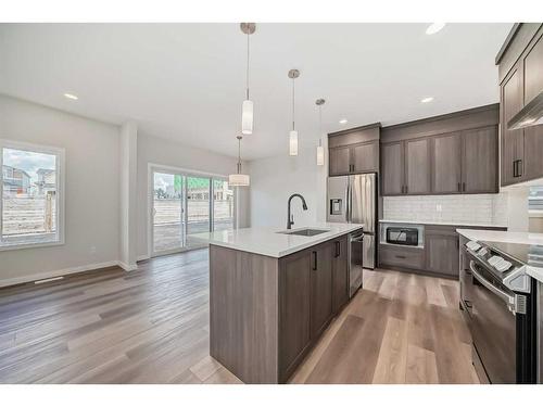 482 Lucas Way Nw, Calgary, AB - Indoor Photo Showing Kitchen With Stainless Steel Kitchen With Upgraded Kitchen