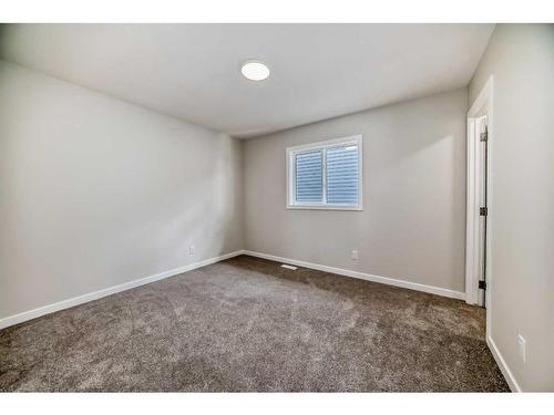 482 Lucas Way Nw, Calgary, AB - Indoor Photo Showing Other Room