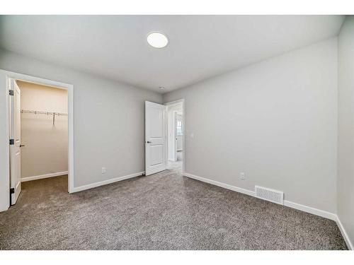 482 Lucas Way Nw, Calgary, AB - Indoor Photo Showing Other Room