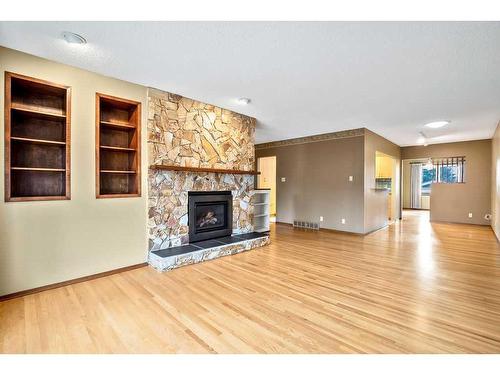 5131 Veronica Road Nw, Calgary, AB - Indoor Photo Showing Living Room With Fireplace