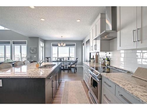 22 Evansborough View Nw, Calgary, AB - Indoor Photo Showing Kitchen With Upgraded Kitchen