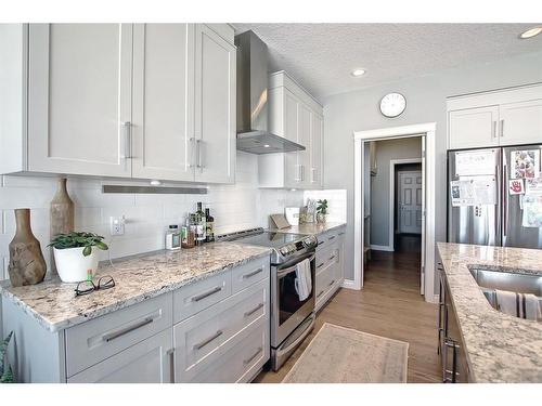 22 Evansborough View Nw, Calgary, AB - Indoor Photo Showing Kitchen With Upgraded Kitchen