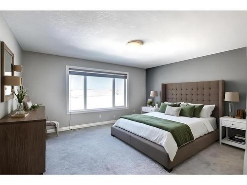 22 Evansborough View Nw, Calgary, AB - Indoor Photo Showing Bedroom