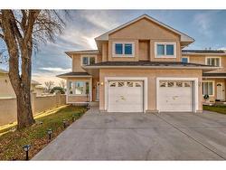 8-388 Sandarac Drive NW Calgary, AB T3K 4E3