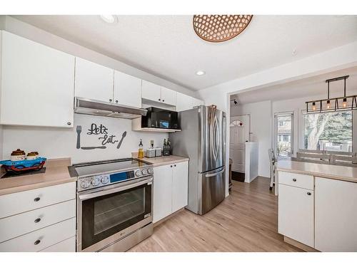 8-388 Sandarac Drive Nw, Calgary, AB - Indoor Photo Showing Kitchen