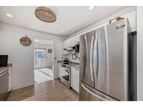 8-388 Sandarac Drive Nw, Calgary, AB - Indoor Photo Showing Kitchen With Stainless Steel Kitchen