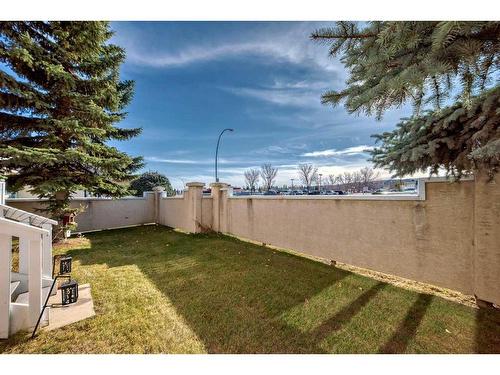 8-388 Sandarac Drive Nw, Calgary, AB - Outdoor