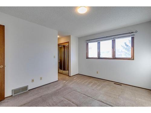 7 Woodmont Way Sw, Calgary, AB - Indoor Photo Showing Other Room