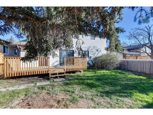 7 Woodmont Way Sw, Calgary, AB - Outdoor With Deck Patio Veranda