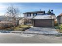 7 Woodmont Way Sw, Calgary, AB  - Outdoor 