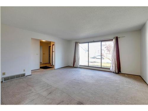 7 Woodmont Way Sw, Calgary, AB - Indoor Photo Showing Other Room