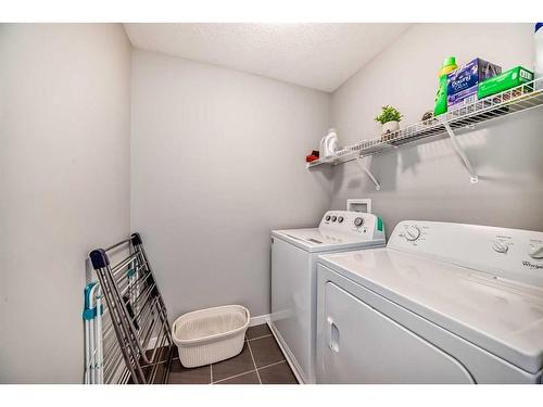 148 Howse Avenue Ne, Calgary, AB - Indoor Photo Showing Laundry Room