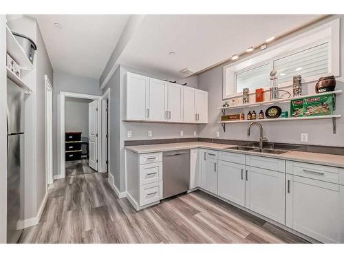 148 Howse Avenue Ne, Calgary, AB - Indoor Photo Showing Kitchen With Double Sink