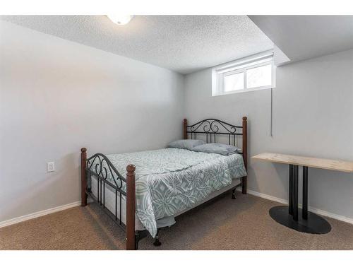 3036 33A Street Se, Calgary, AB - Indoor Photo Showing Bedroom