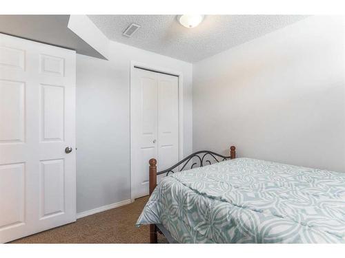 3036 33A Street Se, Calgary, AB - Indoor Photo Showing Bedroom