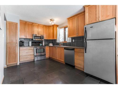 3036 33A Street Se, Calgary, AB - Indoor Photo Showing Kitchen