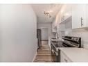 67-2727 Rundleson Road Ne, Calgary, AB  - Indoor Photo Showing Kitchen With Double Sink 