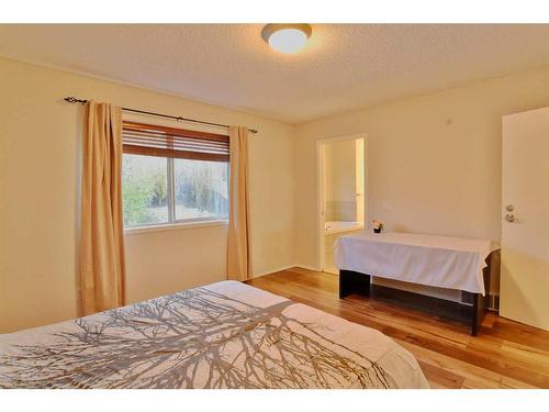 133 Panamount Court Nw, Calgary, AB - Indoor Photo Showing Bedroom