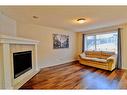 133 Panamount Court Nw, Calgary, AB  - Indoor Photo Showing Living Room 