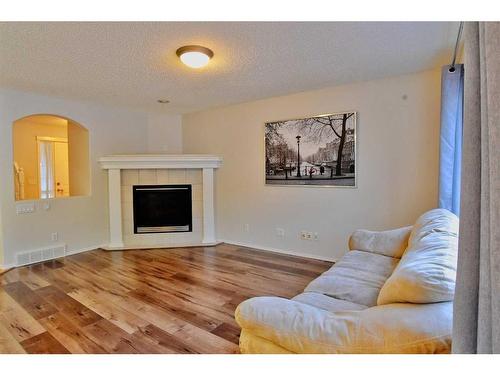 133 Panamount Court Nw, Calgary, AB - Indoor Photo Showing Living Room