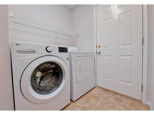 133 Panamount Court Nw, Calgary, AB - Indoor Photo Showing Laundry Room