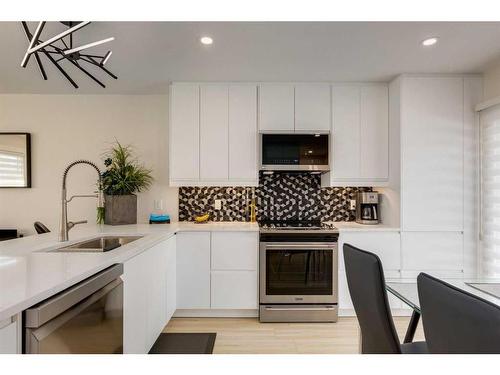 9339 Allison Drive Se, Calgary, AB - Indoor Photo Showing Kitchen