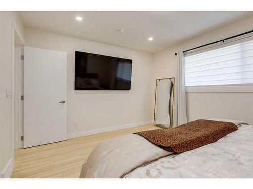 9339 Allison Drive Se, Calgary, AB - Indoor Photo Showing Bedroom