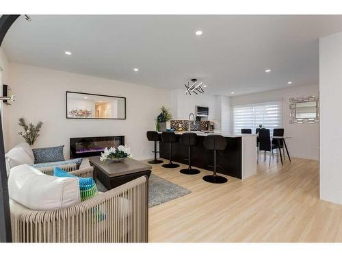 9339 Allison Drive Se, Calgary, AB - Indoor Photo Showing Living Room