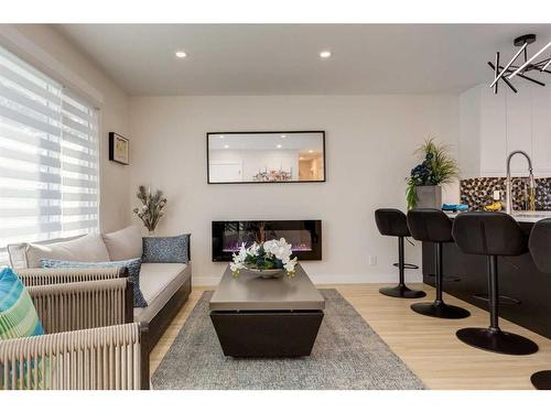 9339 Allison Drive Se, Calgary, AB - Indoor Photo Showing Living Room