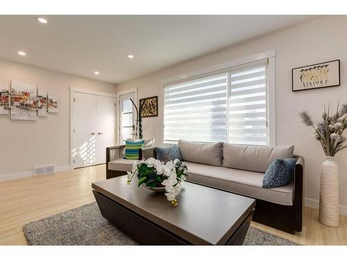 9339 Allison Drive Se, Calgary, AB - Indoor Photo Showing Living Room