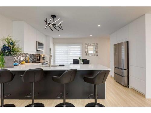 9339 Allison Drive Se, Calgary, AB - Indoor Photo Showing Kitchen With Upgraded Kitchen