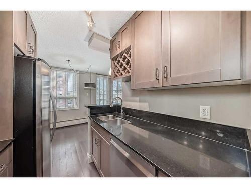 306-733 14 Avenue, Calgary, AB - Indoor Photo Showing Kitchen With Double Sink