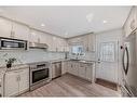 23 Sanderling Rise Nw, Calgary, AB  - Indoor Photo Showing Kitchen With Stainless Steel Kitchen With Upgraded Kitchen 