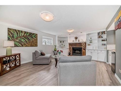 23 Sanderling Rise Nw, Calgary, AB - Indoor Photo Showing Living Room With Fireplace