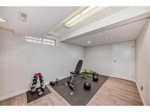 23 Sanderling Rise Nw, Calgary, AB - Indoor Photo Showing Gym Room