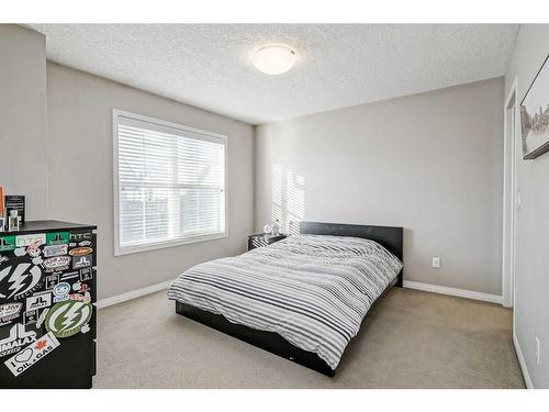 610 Cranford Court Se, Calgary, AB - Indoor Photo Showing Bedroom