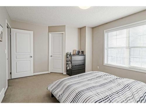 610 Cranford Court Se, Calgary, AB - Indoor Photo Showing Bedroom