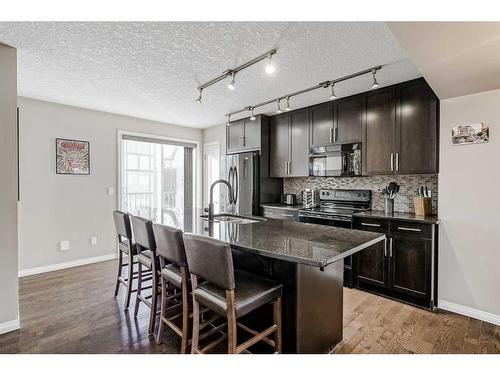 610 Cranford Court Se, Calgary, AB - Indoor Photo Showing Kitchen With Upgraded Kitchen