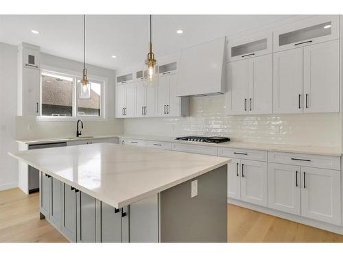 18 Ranchers Bay, Okotoks, AB - Indoor Photo Showing Kitchen With Upgraded Kitchen