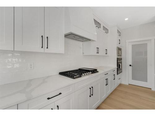 18 Ranchers Bay, Okotoks, AB - Indoor Photo Showing Kitchen