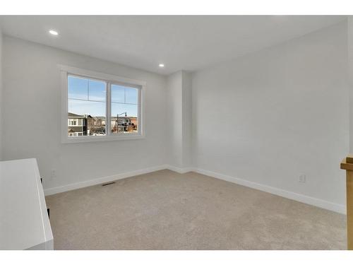 18 Ranchers Bay, Okotoks, AB - Indoor Photo Showing Other Room