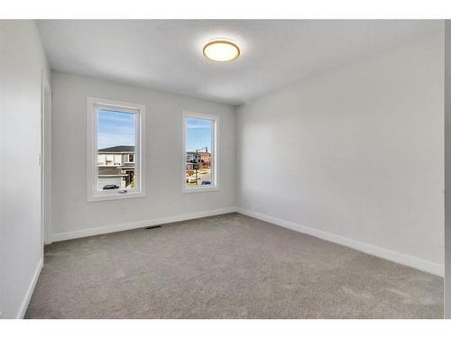 18 Ranchers Bay, Okotoks, AB - Indoor Photo Showing Other Room