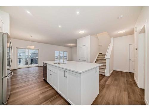 1034 Thimbleberry Hill Sw, Airdrie, AB - Indoor Photo Showing Kitchen