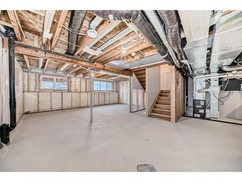 1034 Thimbleberry Hill Sw, Airdrie, AB - Indoor Photo Showing Basement