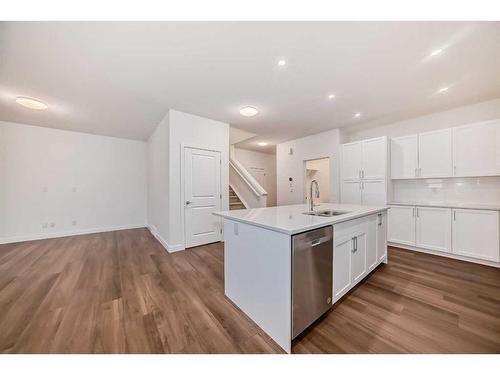 1034 Thimbleberry Hill Sw, Airdrie, AB - Indoor Photo Showing Kitchen