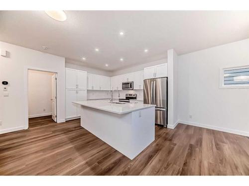 1034 Thimbleberry Hill Sw, Airdrie, AB - Indoor Photo Showing Kitchen