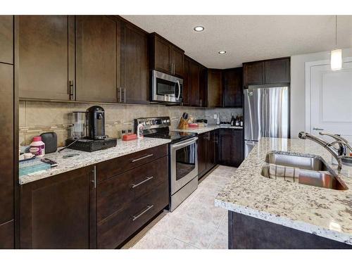 401-24 Varsity Estates Circle Nw, Calgary, AB - Indoor Photo Showing Kitchen With Double Sink With Upgraded Kitchen